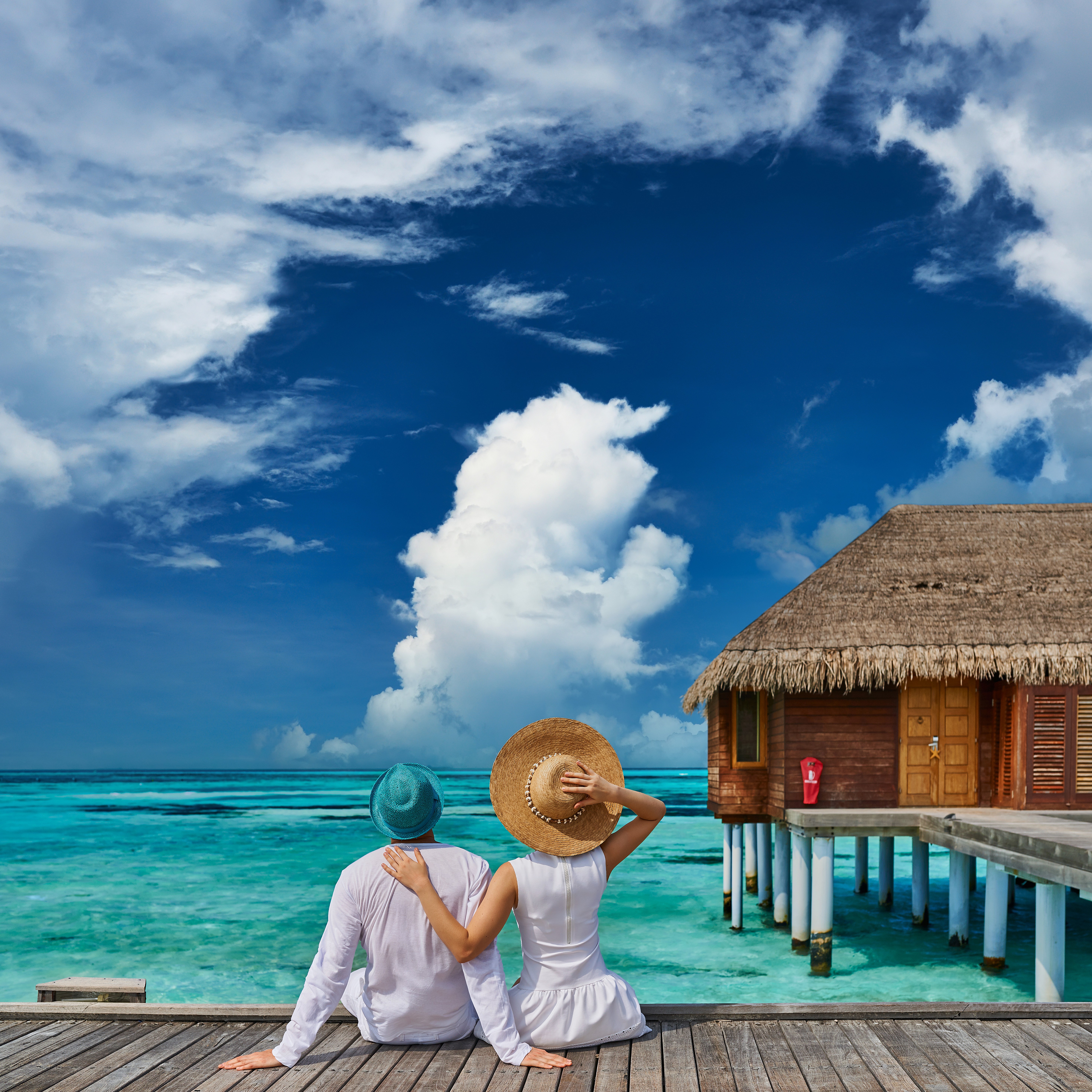 /images/destination/couple-in-white-on-a-tropical-beach-jetty-2026-03-10-01-05-23-utc.jpg